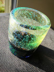 green and black shotglass