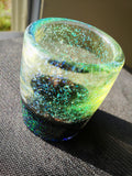 green and black shotglass